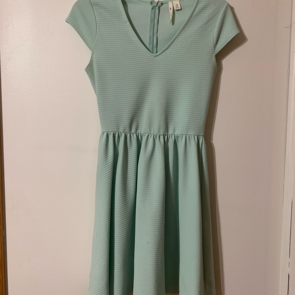 Turquoise, ribbed spring dress.
